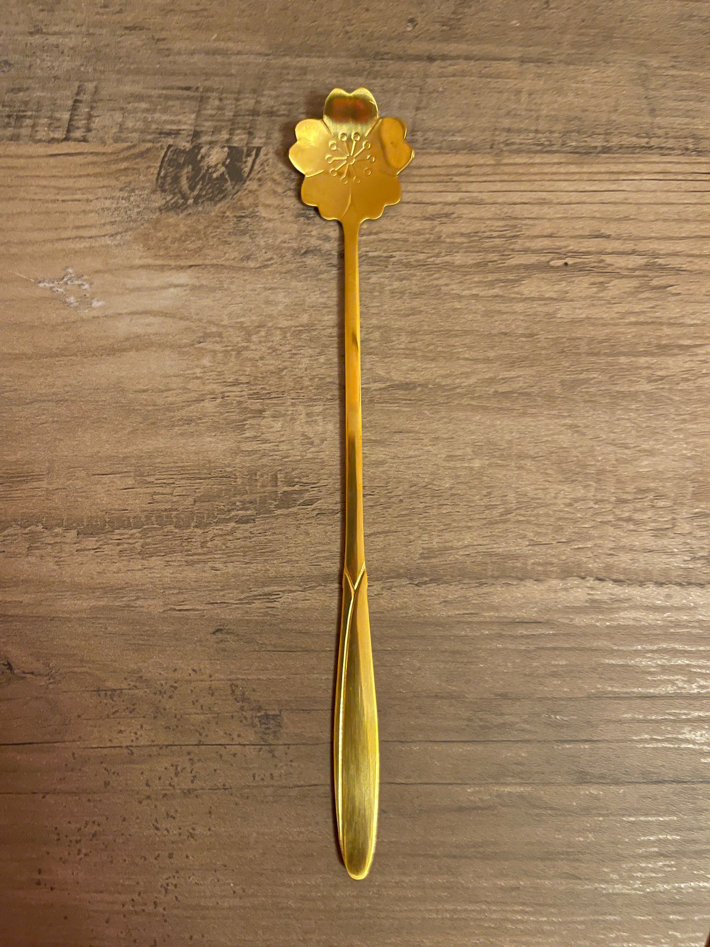 Gold daisy teaspoon.
