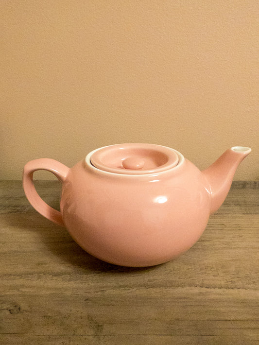 Pink ceramic teapot.