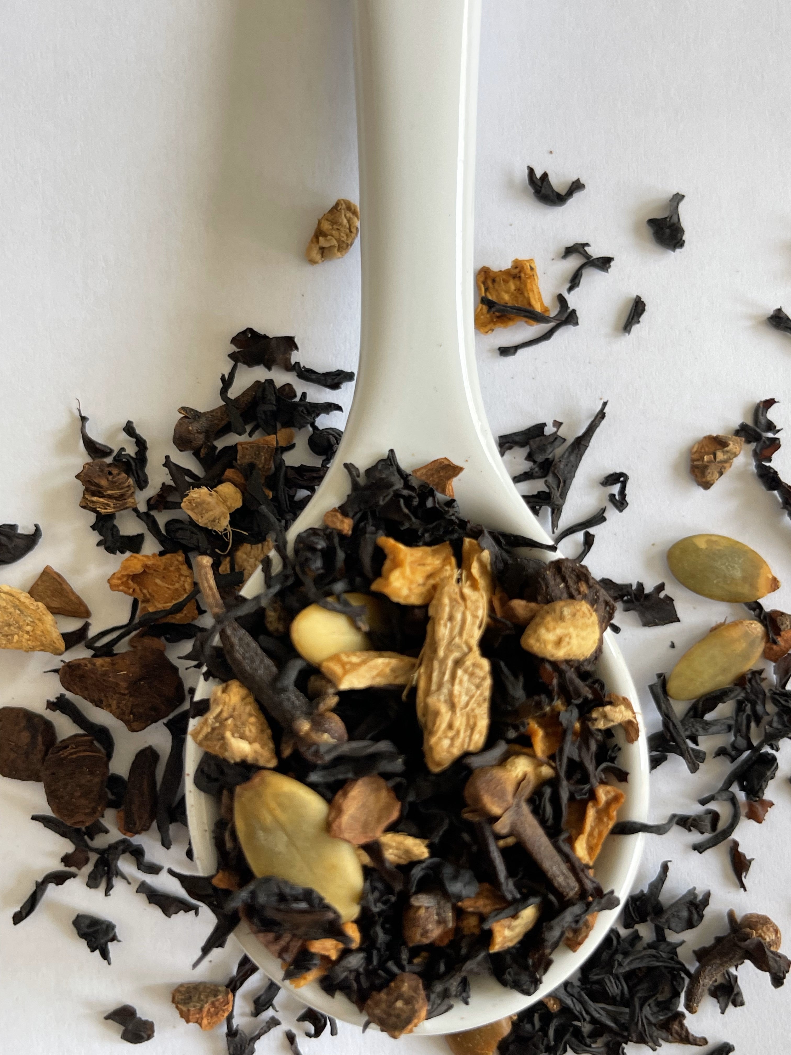 Black tea blend with cinnamon bits, ginger, pumpkin bits, pumpkin seeds, chicory root, cardamom, and cloves.