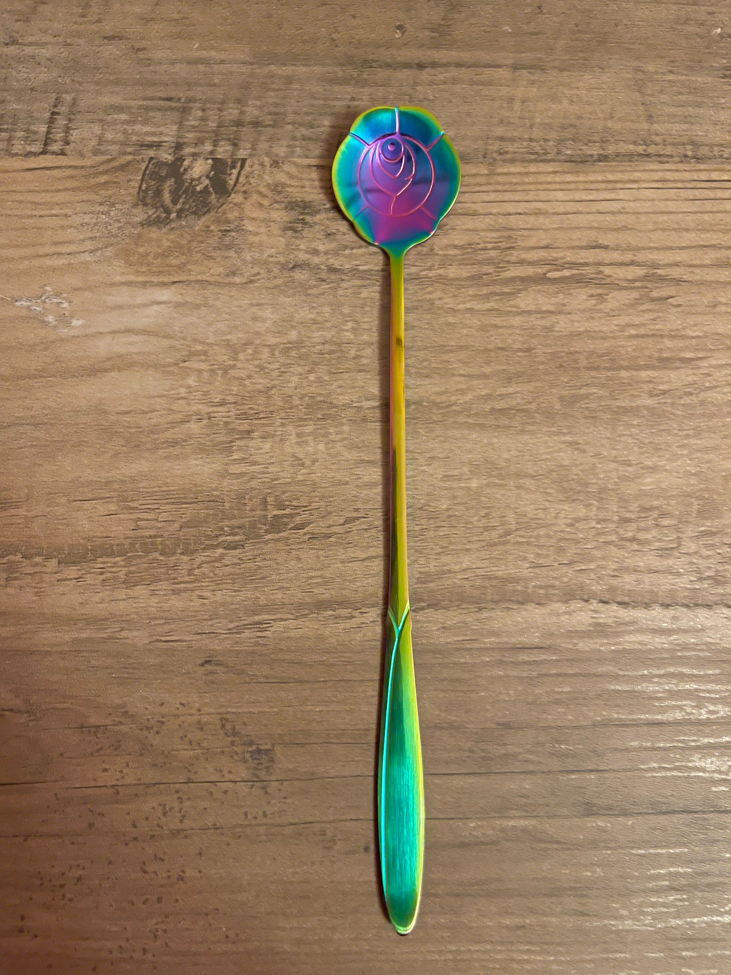 Rainbow rose-shaped teaspoon.