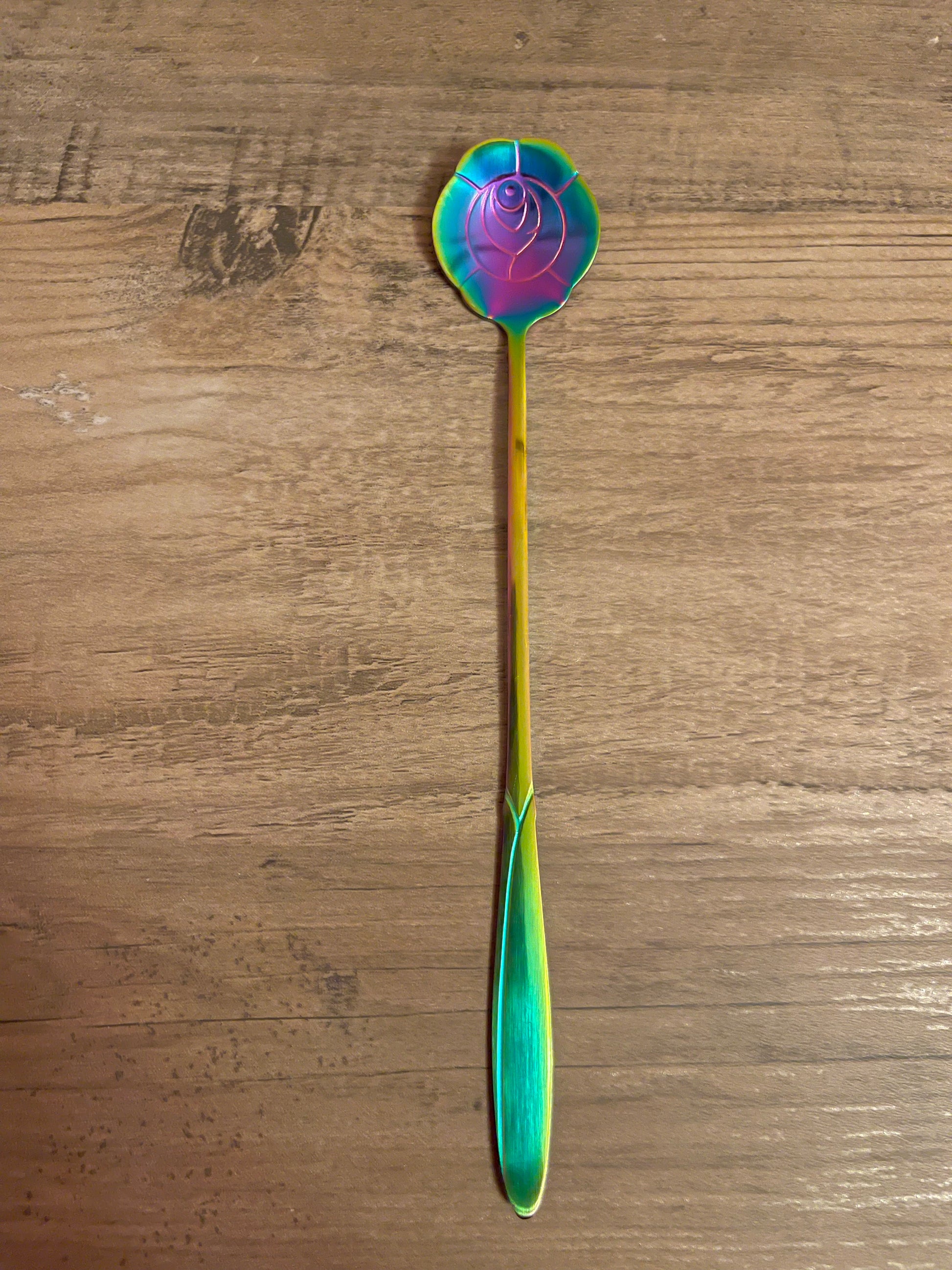 Rainbow rose-shaped teaspoon.
