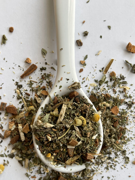 Herbal tea blend of raspberry leaf, nettle leaf, cramp bark, motherwort, peppermint, chamomile, lemon balm, and cinnamon.